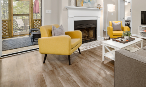 A living room with wood laminate flooring
