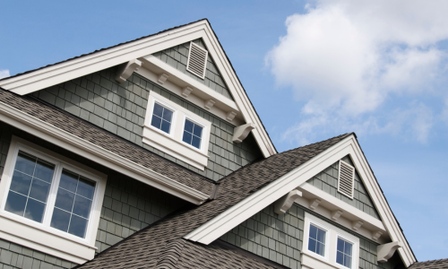 A home with a shingle roof